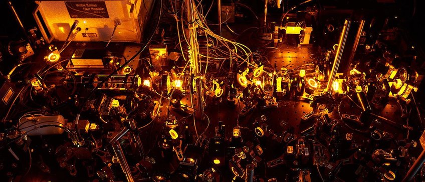 Picture of the sodium laser system generating the yellow light used for laser cooling and imaging of sodium atoms.